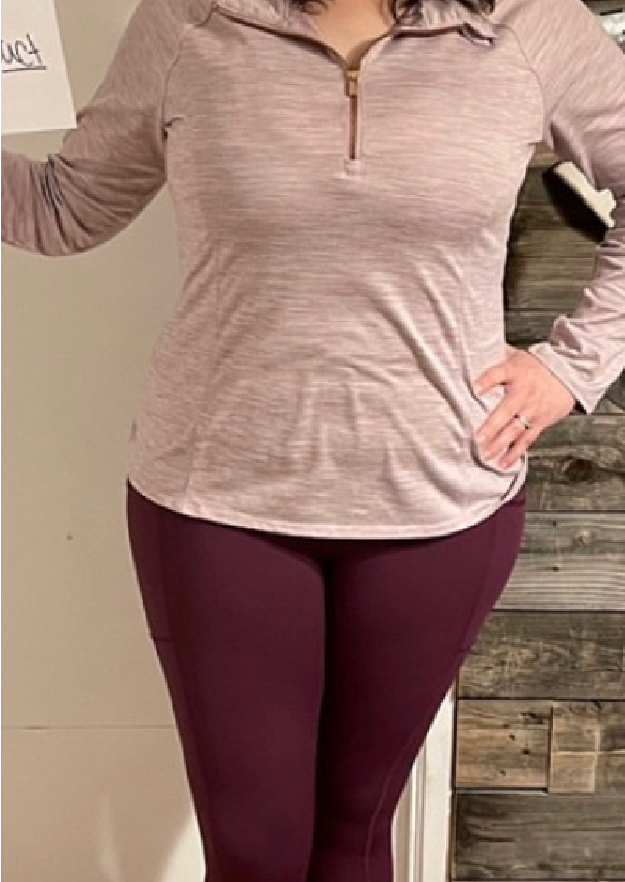 Before photo of a woman before experiencing her fitness plan.